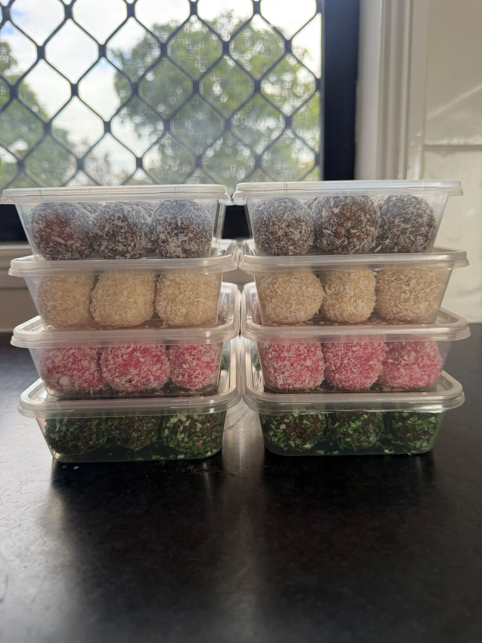 Tubs of handmade balls in four flavours